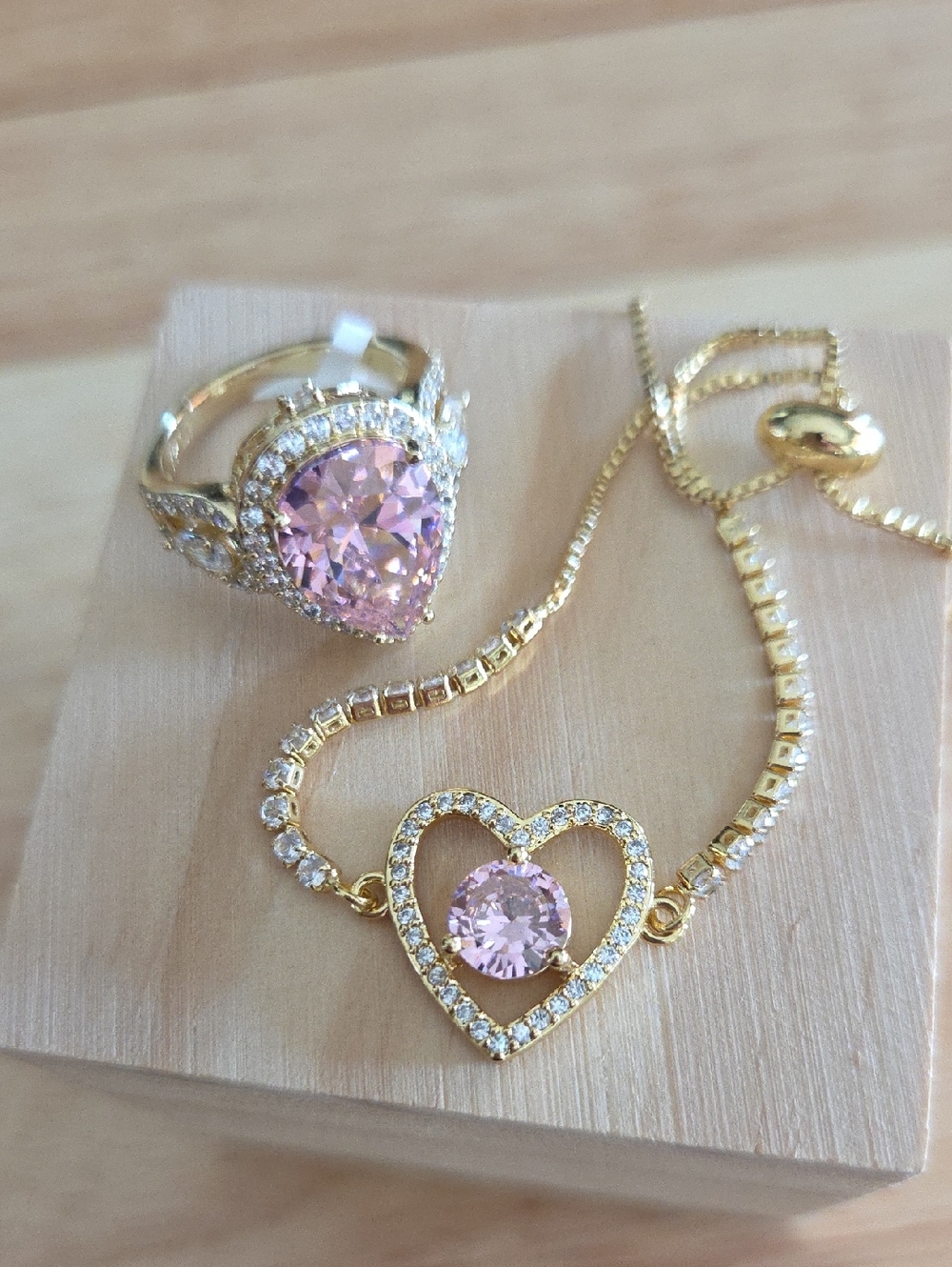 Gold-Plated Heart Bracelet with Pink Center Stone
